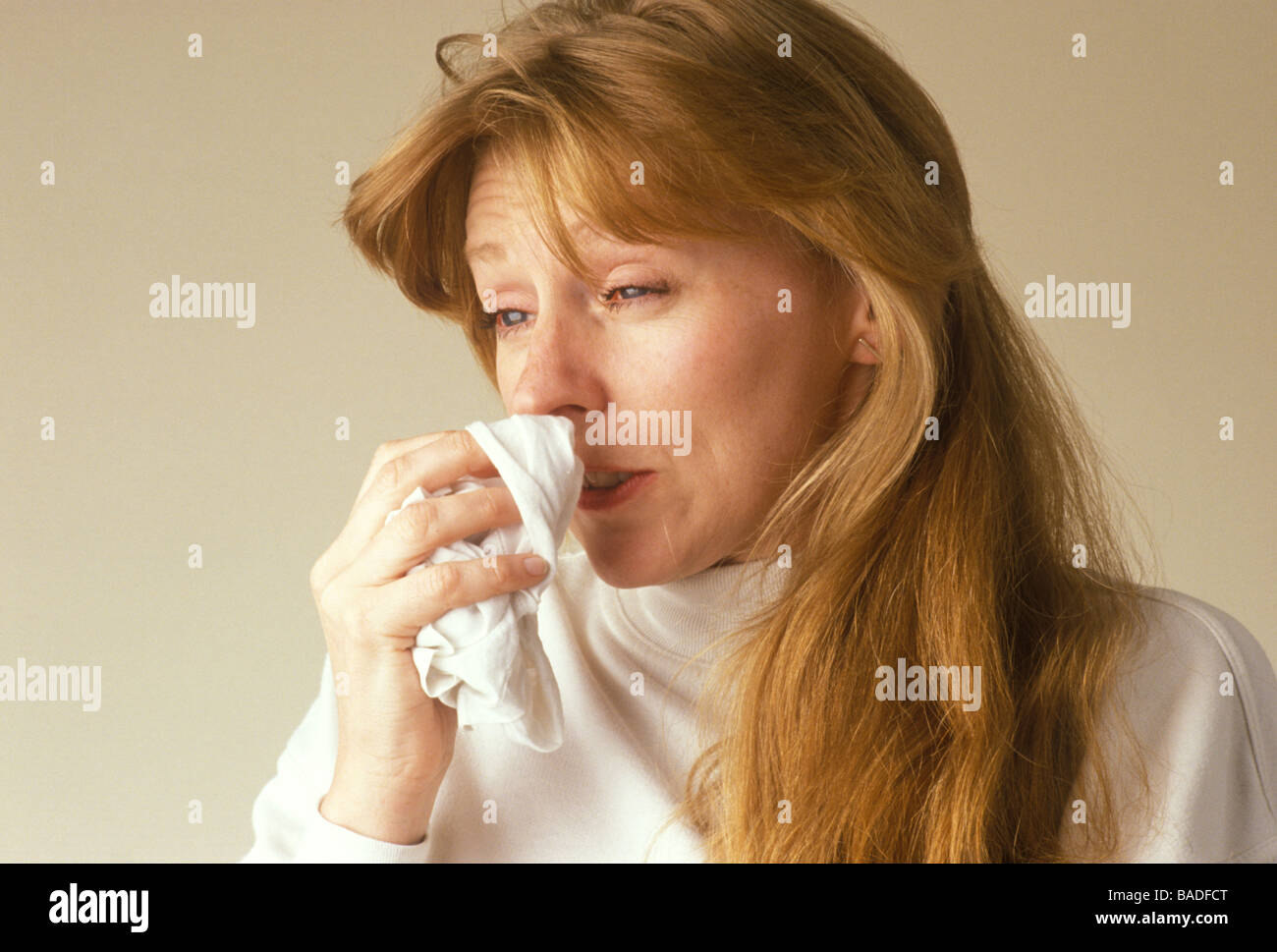 Woman With An Itchy Nose And Watery Eyes As If Suffering From An