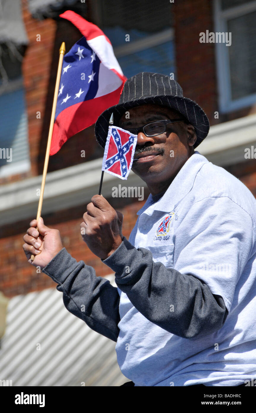 Afrcian American with Confederate Flag on Patriotic Float in Strawberry Festival Parade Plant City Florida Stock Photo