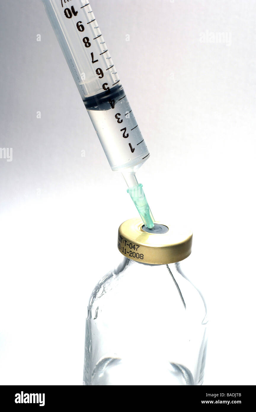 Syringe and bottle Stock Photo Alamy