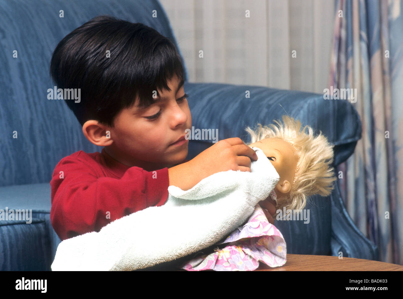 boy with doll