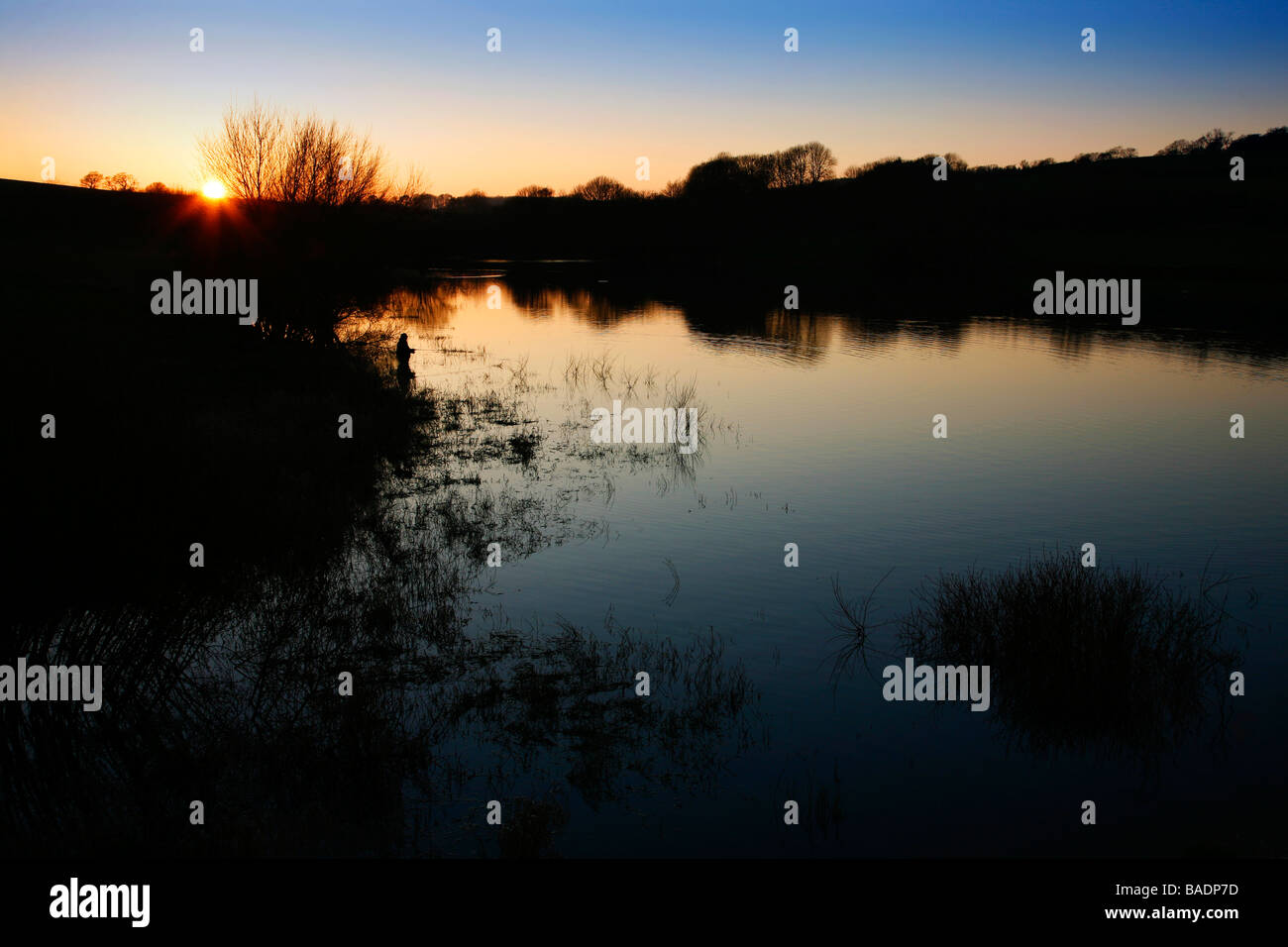 Sunset over Sutton Bingham Reservoir, a popular place for fishing and