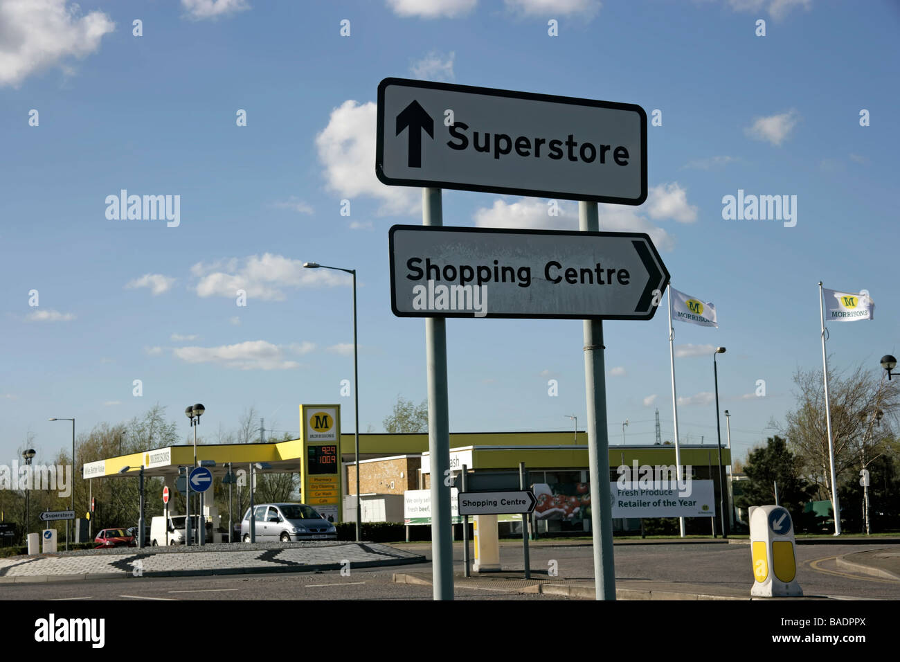 Sign for superstore and shopping centre with Morrisons petrol station