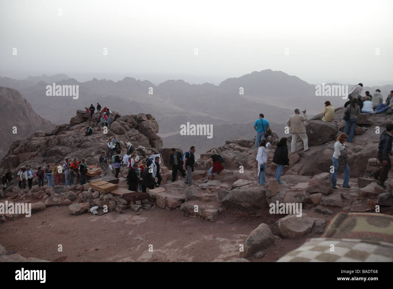 Pilgrims from St Katherines having climbed the Steps of Repentance watching the sunrise on Easter Monday on Mount Sinai Stock Photo