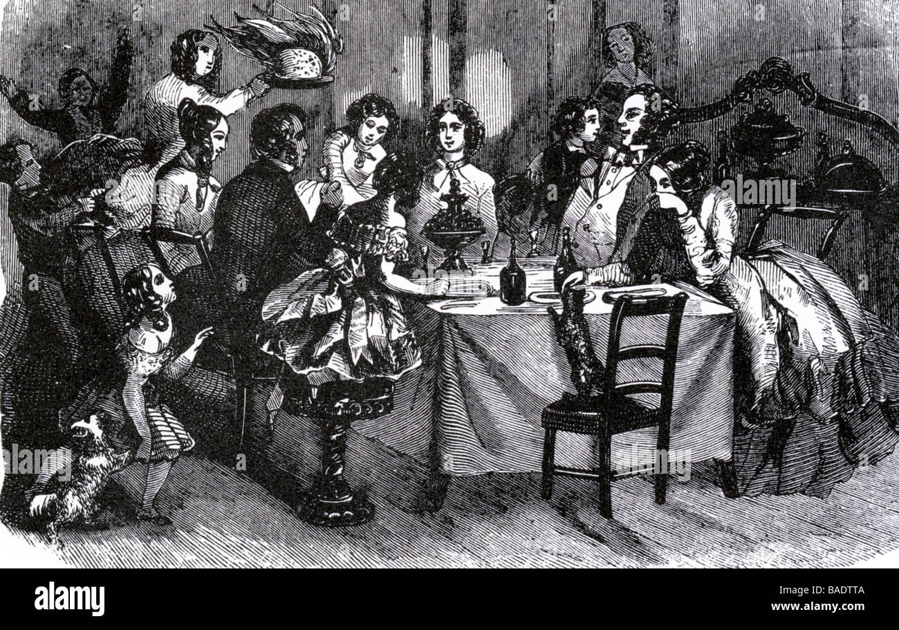 VICTORIAN CHRISTMAS DINNER in a mid-19th century engraving Stock Photo
