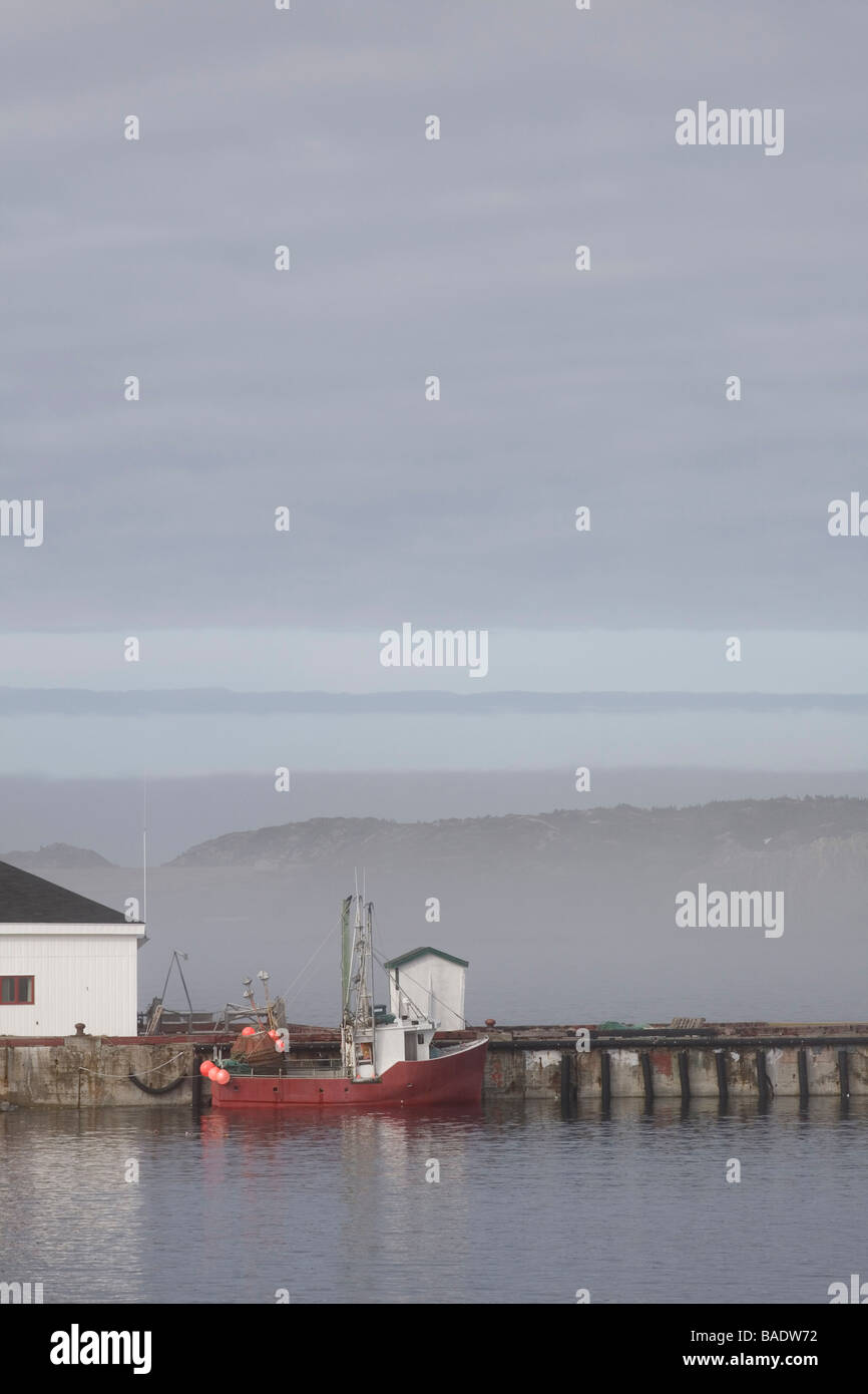 Fishing Boat at Dock, Twillingate Island, Newfoundland, Canada Stock Photo