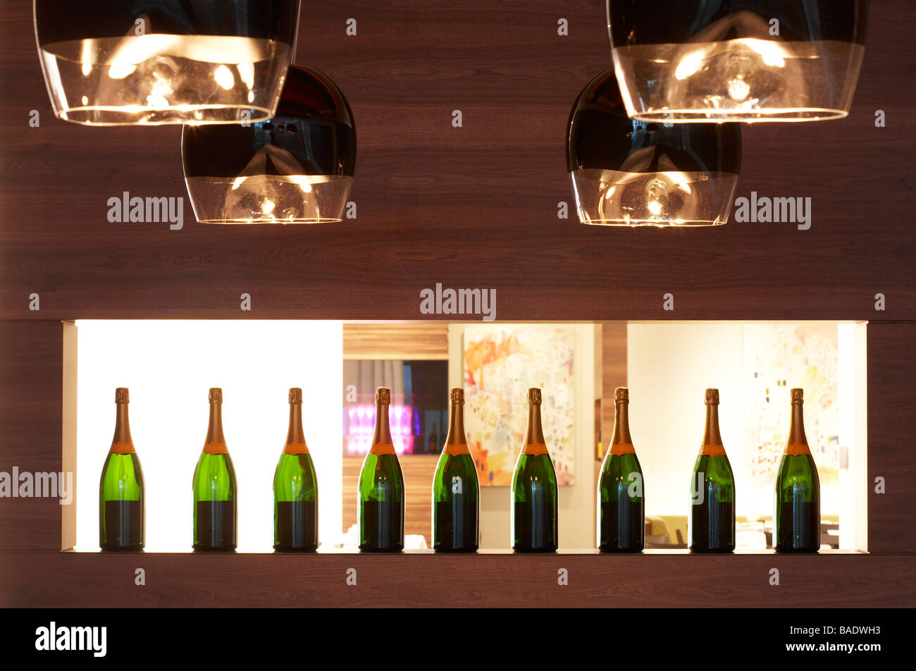 Row of Wine Bottles in Restaurant Stock Photo