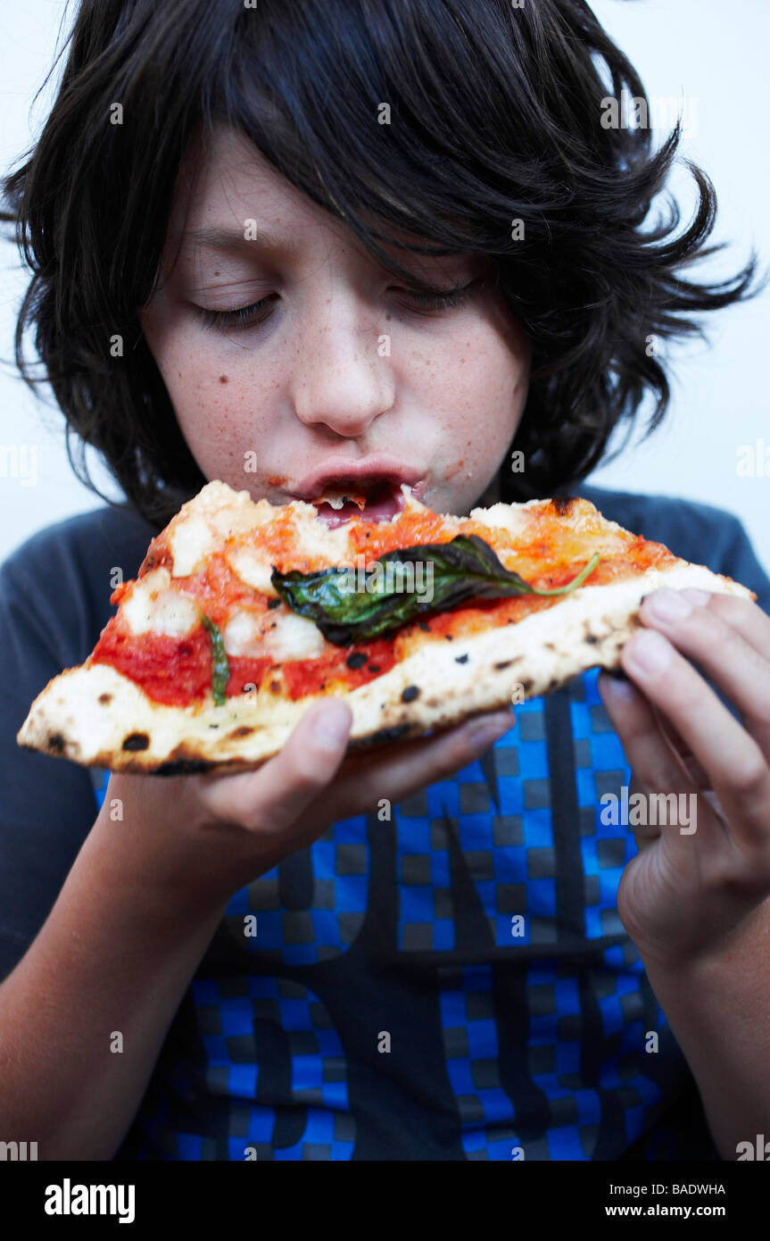 One person teen eating pizza hires stock photography and images Alamy