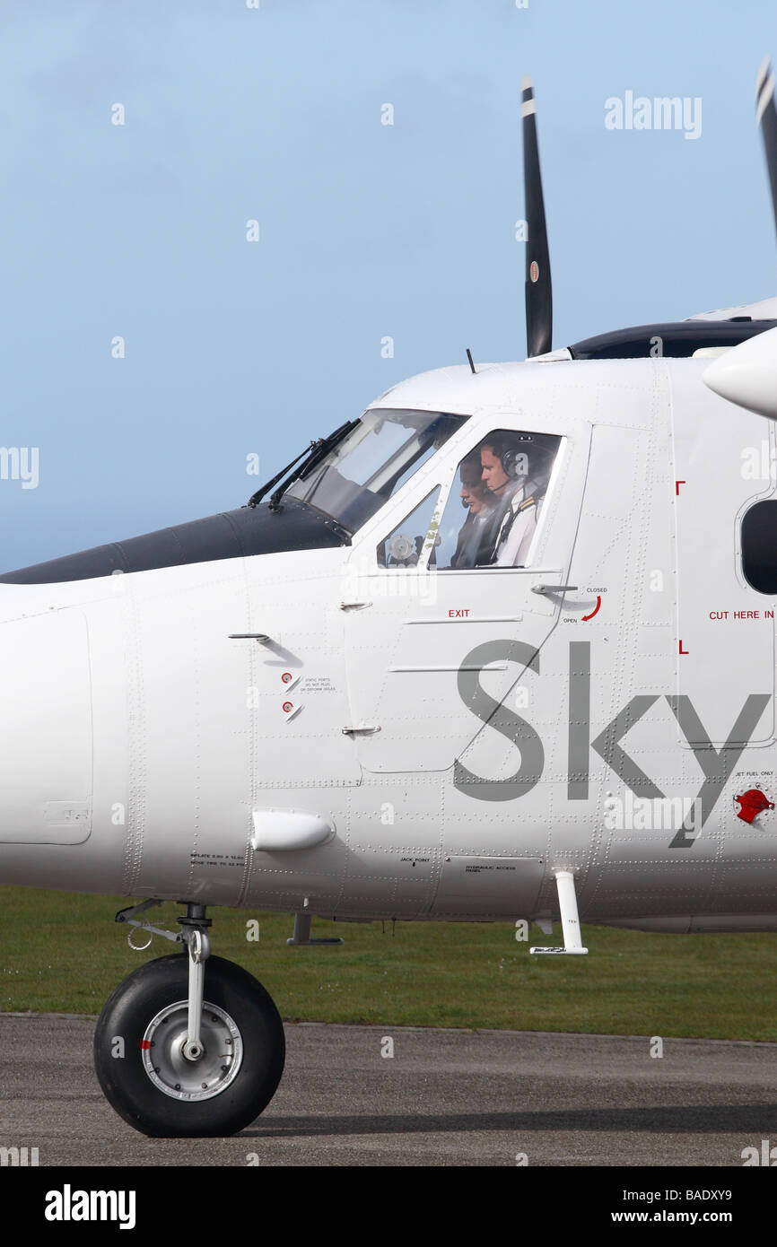 Skybus airlines DHC 6 Twin Otter aircraft prepares to depart Lands End airport at St Just Cornwall flying to the Scilly Isles Stock Photo