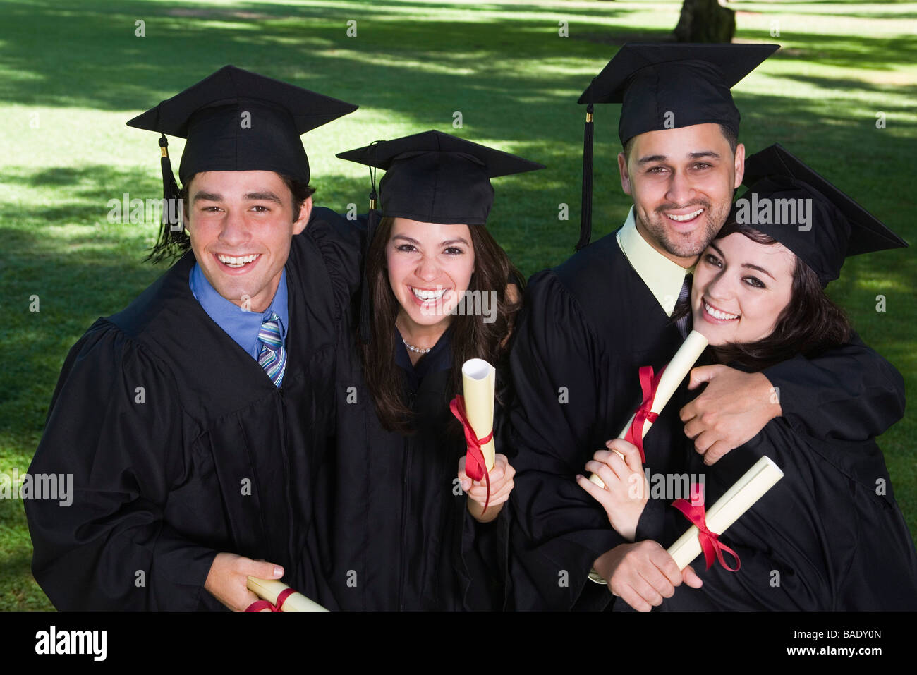 Portrait of College Graduates Stock Photo