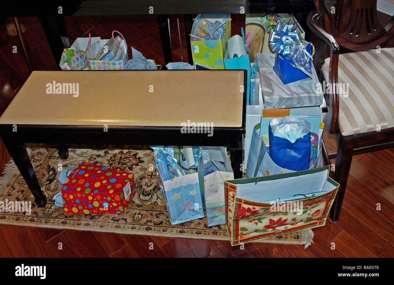 Wrapped Decorative Bags Used For Presents At A Baby Shower All On