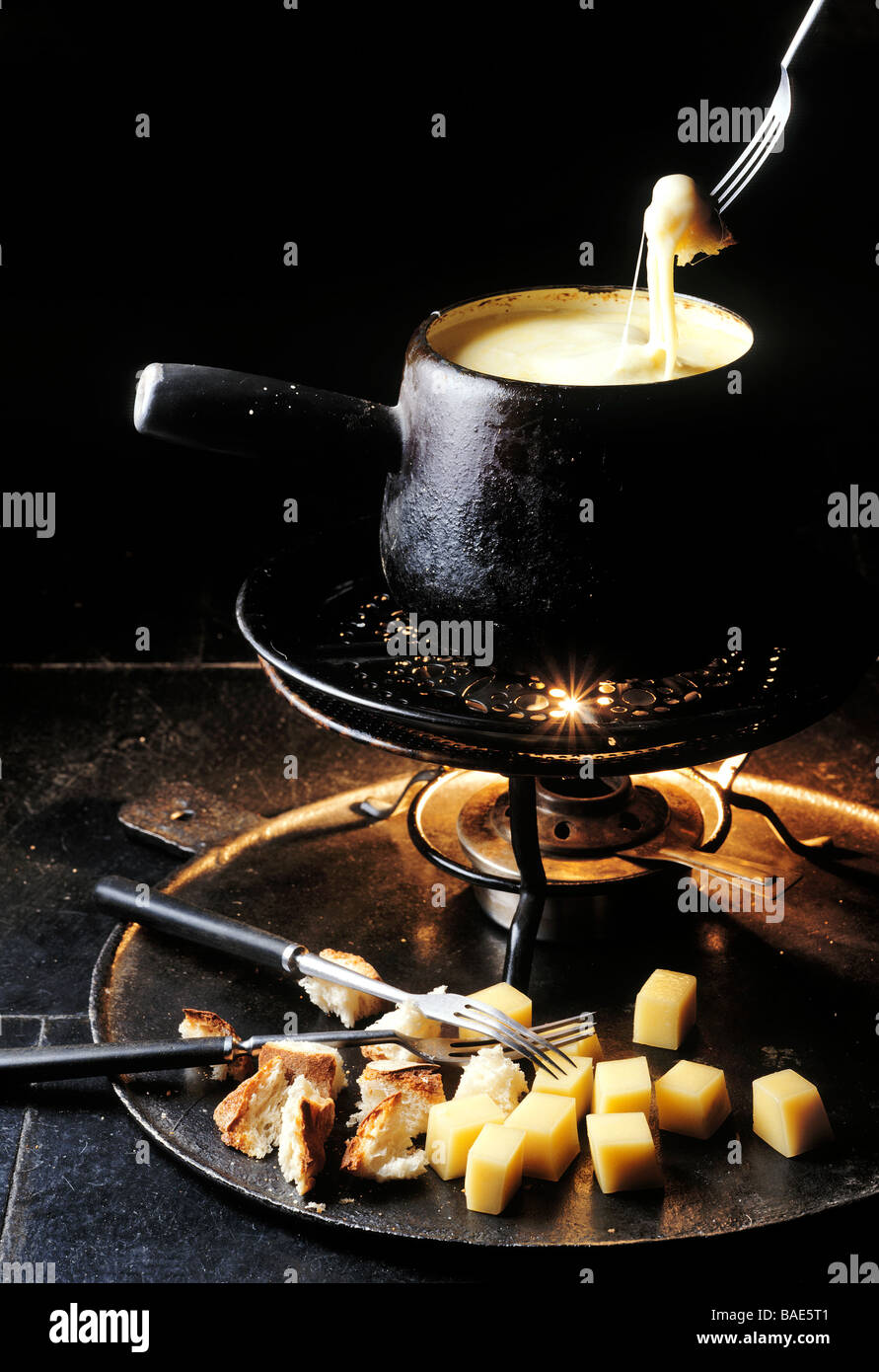 France, Savoie, Val d'Isere, fondue savoyarde at Le Samovar Restaurant