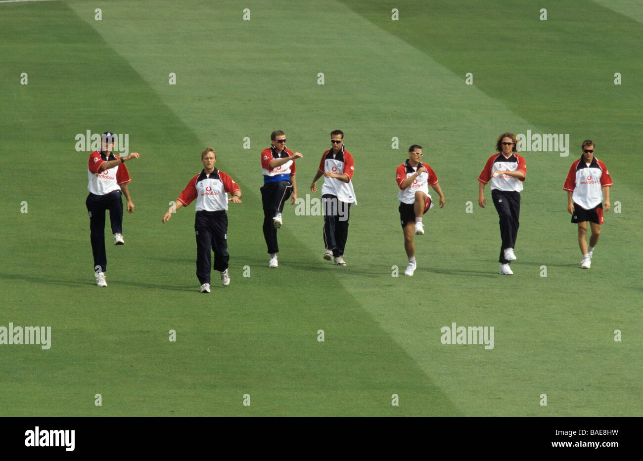 England cricket team doing warming up exercises like a tribal dance on the cricket pitch at Lords before a match with Pakistan Stock Photo