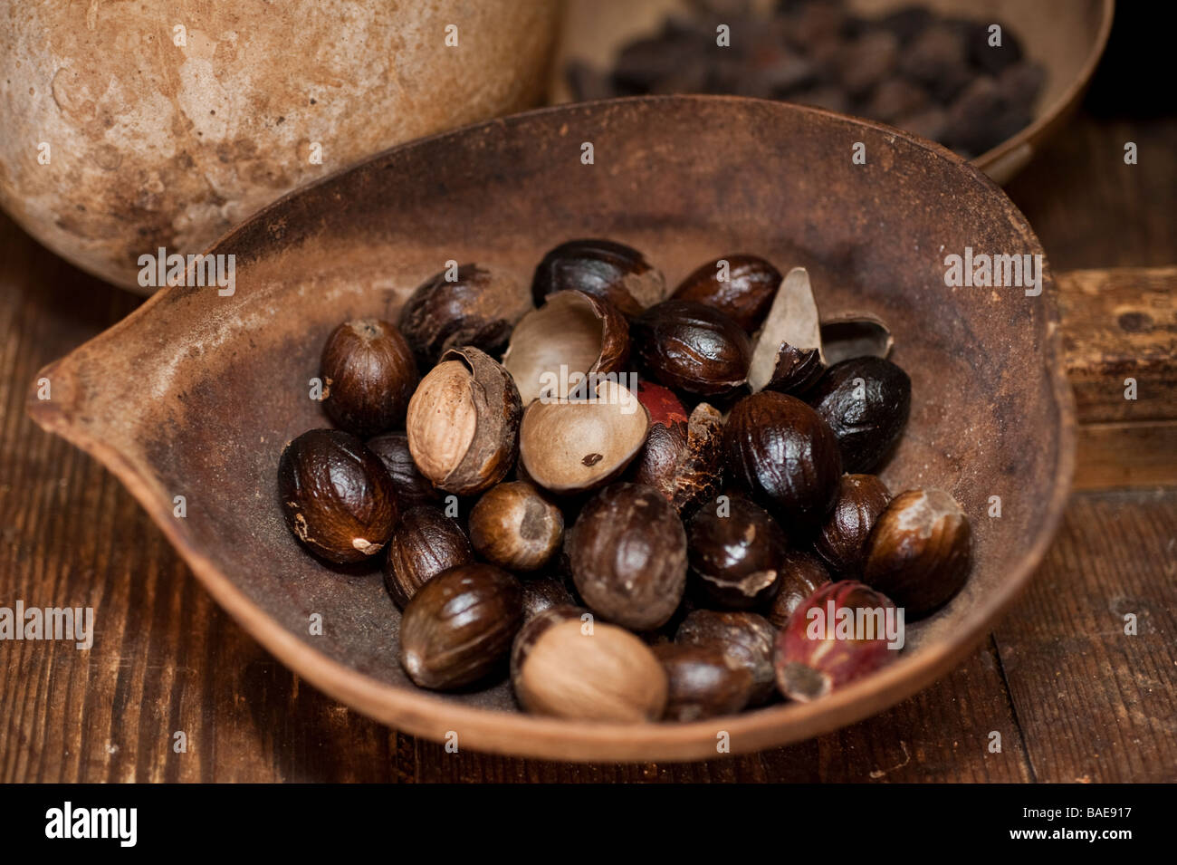 Calabash bowls of nutmegs some in their shell and some with mace
