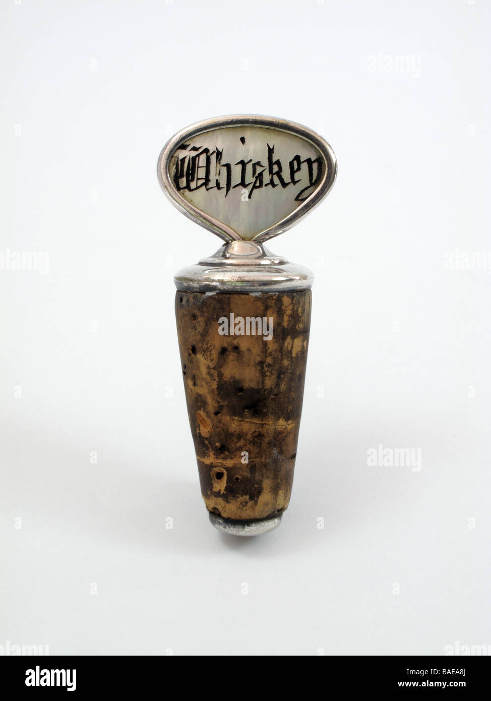 Antique whiskey stopper decanter bottle label c. 1900 Stock Photo