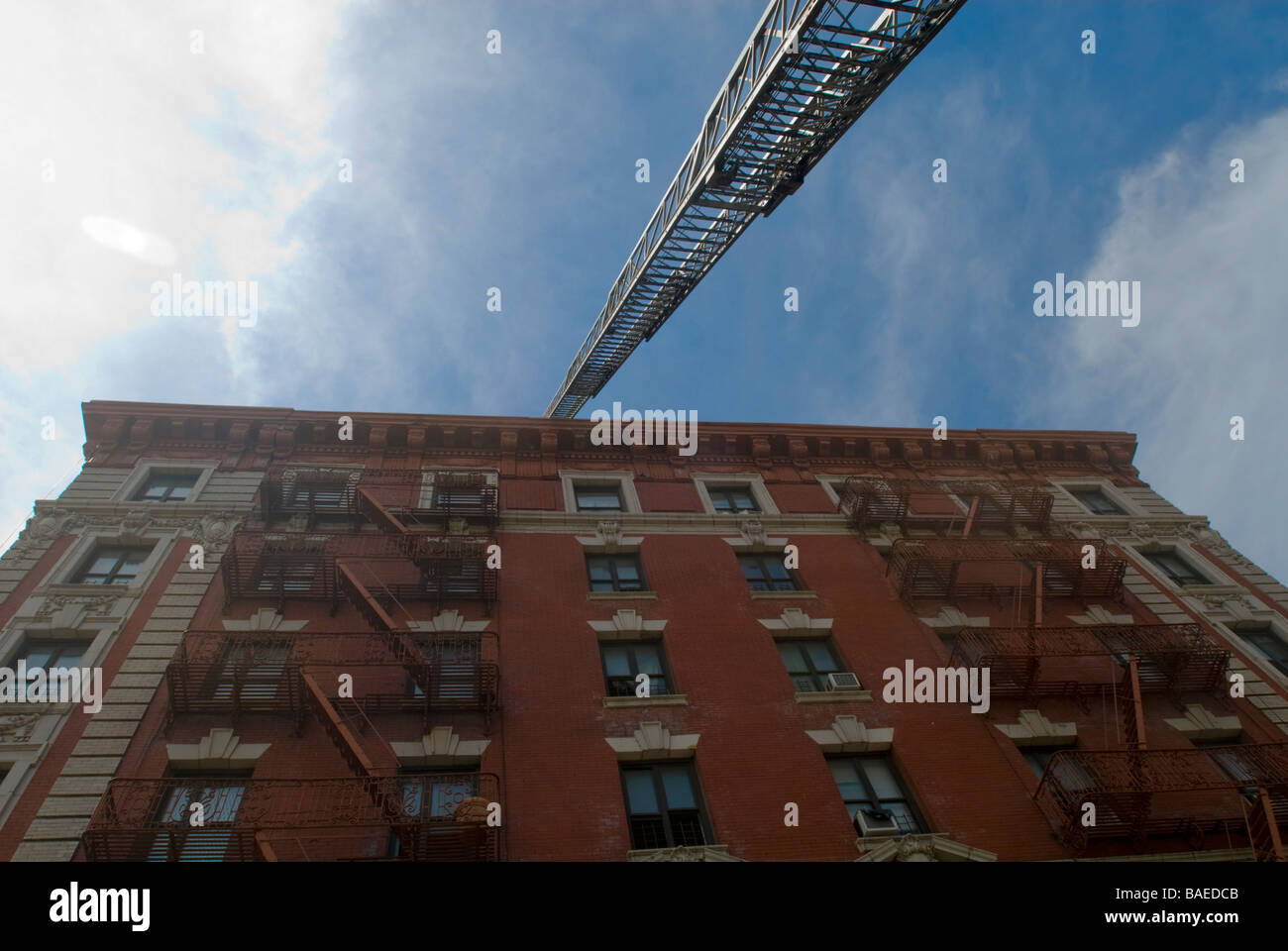 Tower ladder at an all hands fire in a laundromat in Harlem in New York Stock Photo