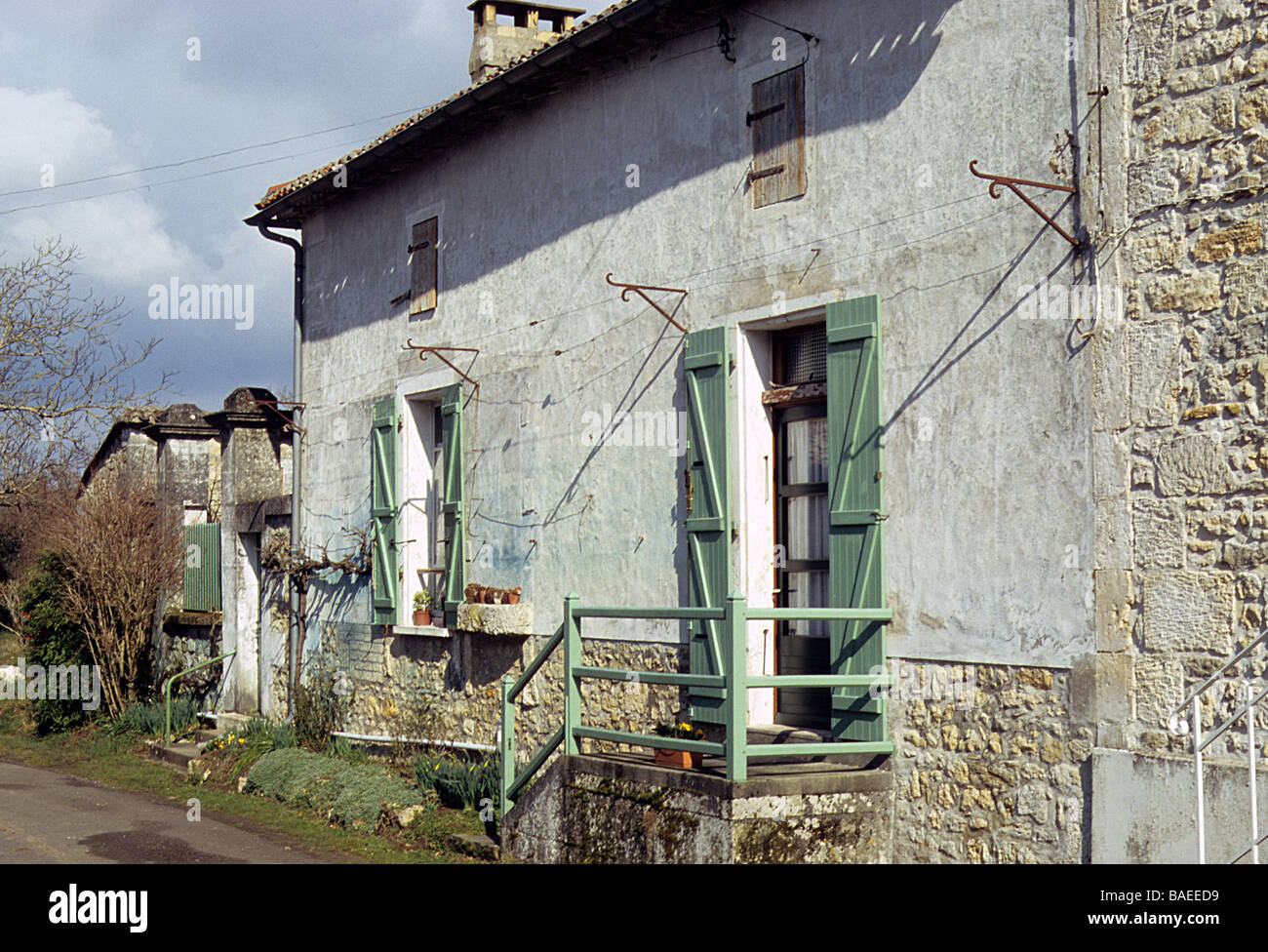 France, typical largely un-restored mid C18 cottage in a small hamlet in the Charente Departement. Stock Photo