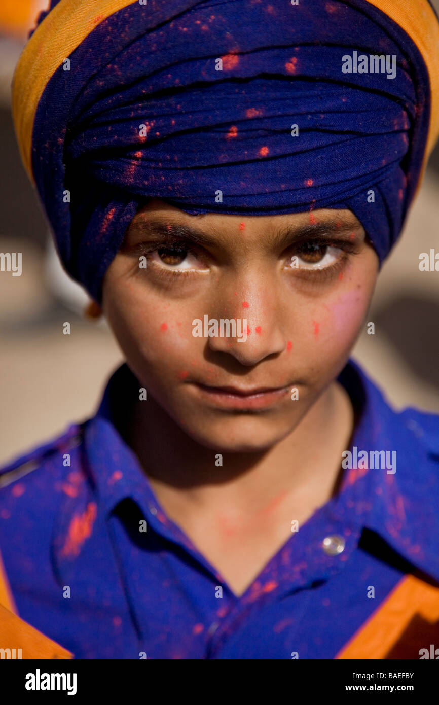 Portrait of a young Nihang/Akali at the festival of Holla Mohalla at Anandpur Saheb in the Indian state of Punjab. India. Asia Stock Photo
