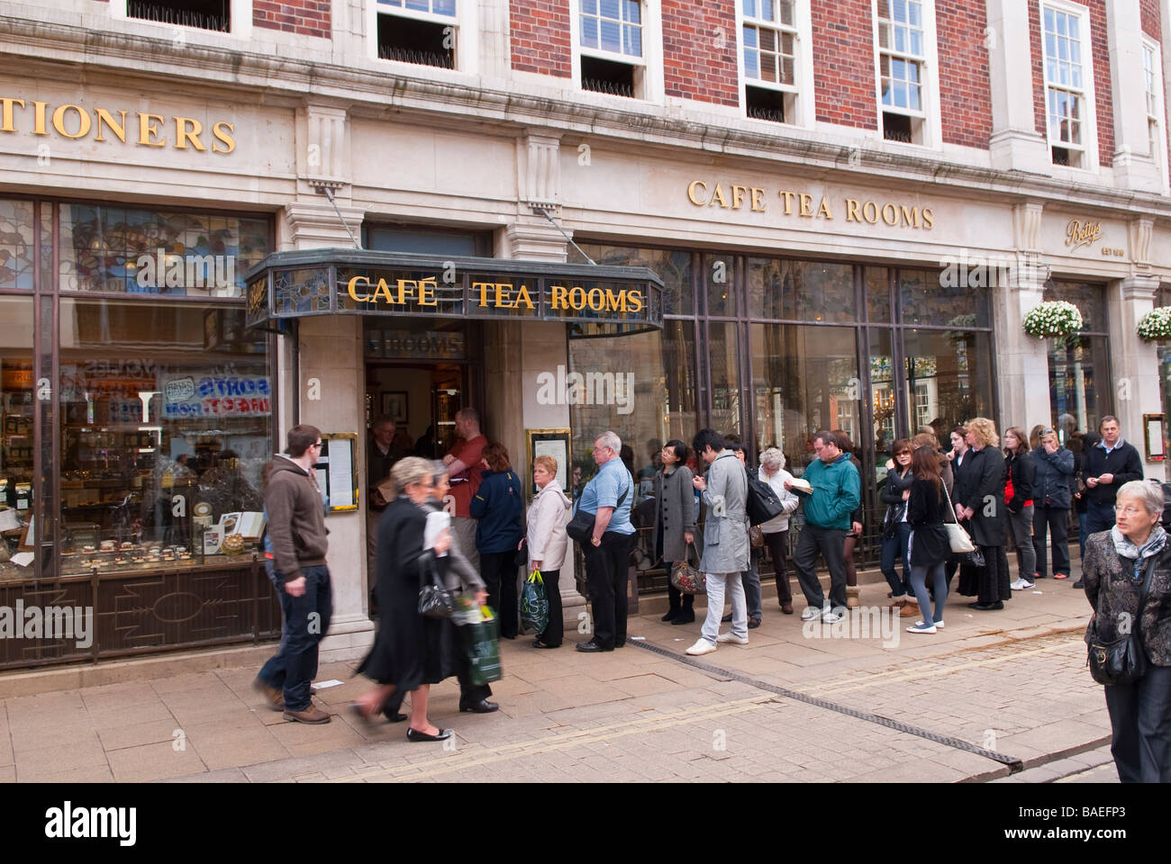 People queing up outside Bettys cafe tea rooms in York,Yorkshire,Uk
