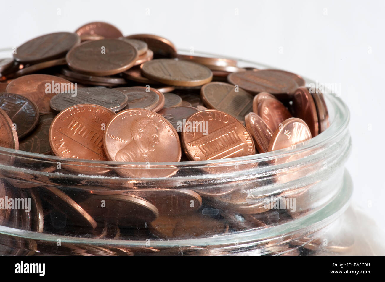 glass jar with pennies Stock Photo Alamy