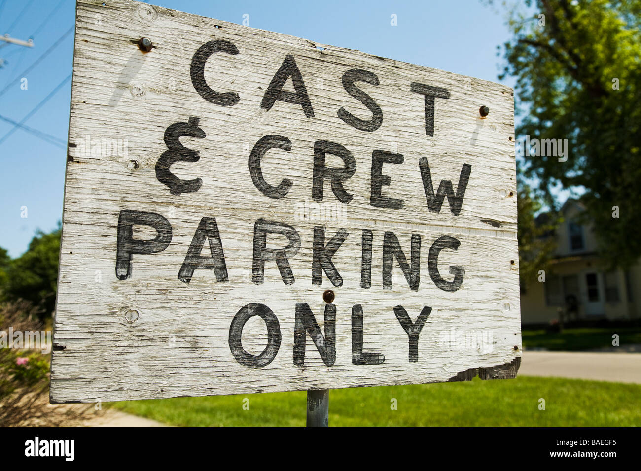 ILLINOIS DeKalb Cast and crew parking only sign painted on wood outside community theater Stock Photo