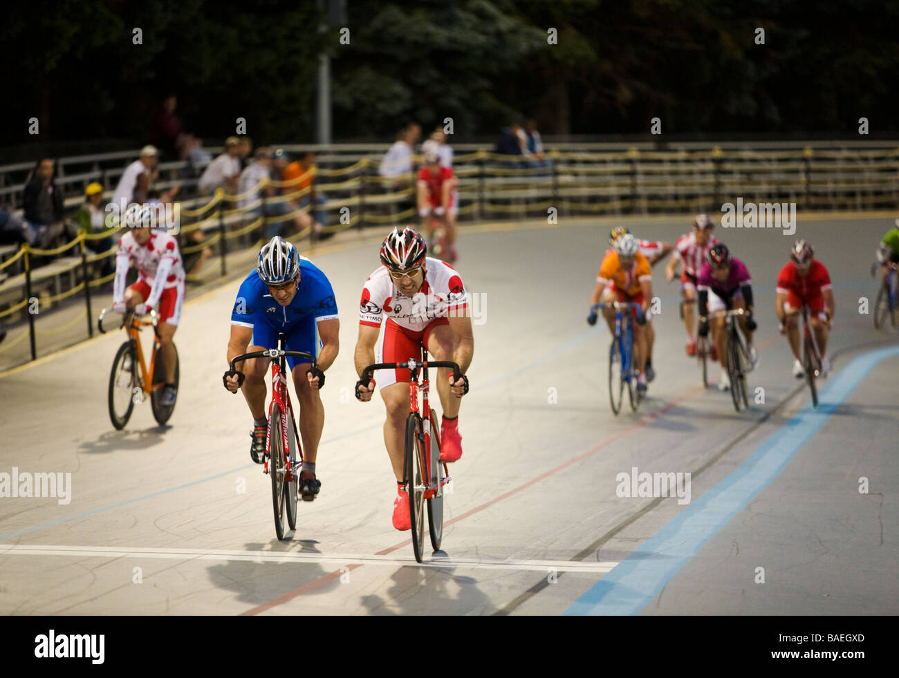 ILLINOIS Northbrook Racers cross lap line during bicycle race at velodrome track Stock Photo