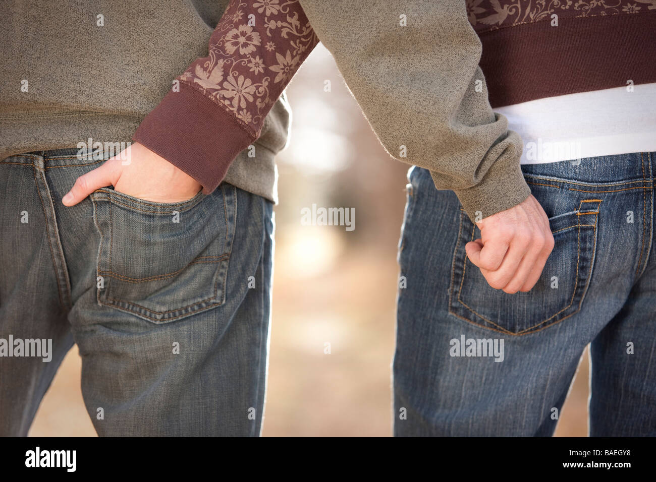 Couple with hands in each others back pockets Stock Photo Alamy