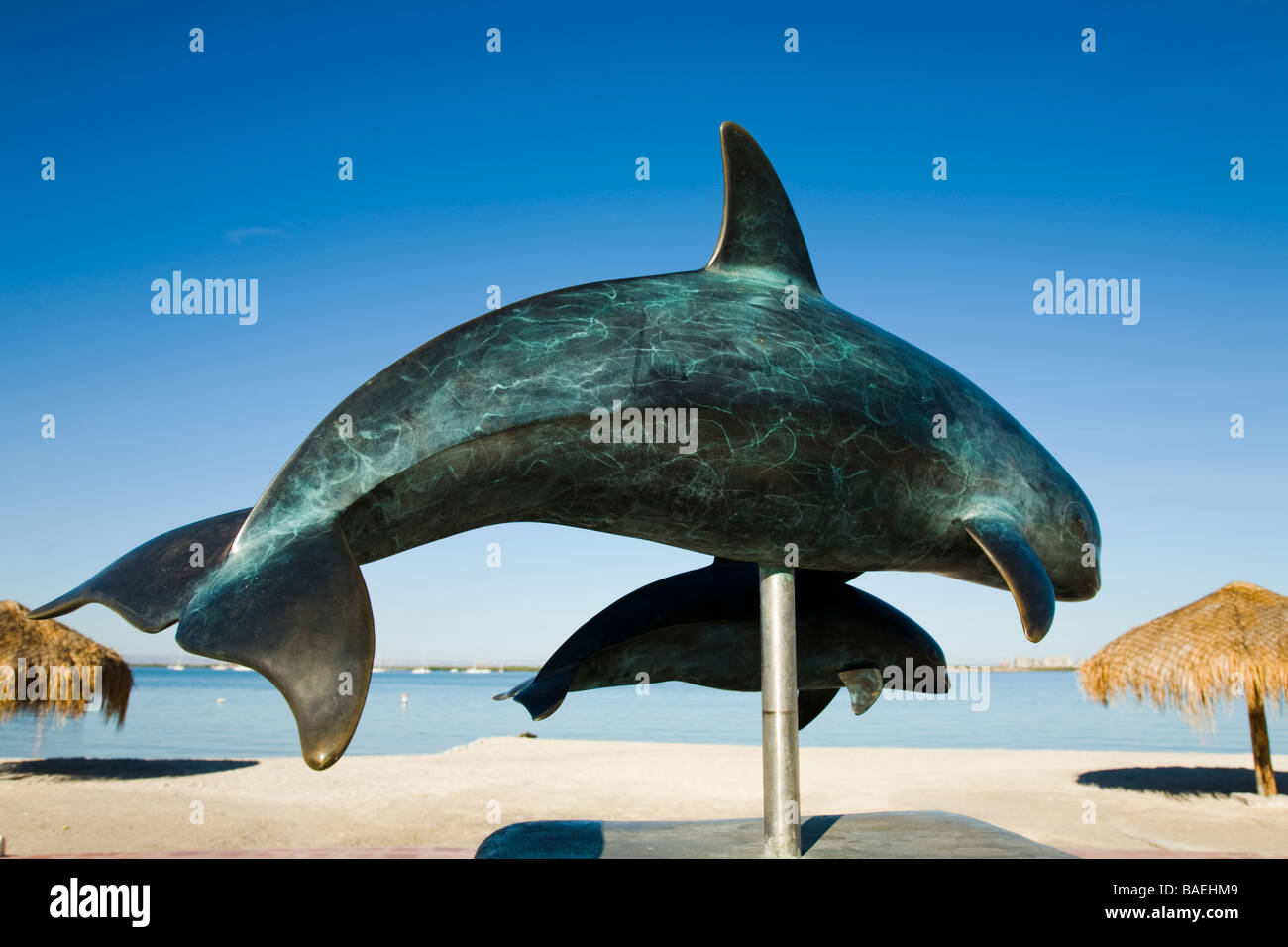MEXICO La Paz Sculpture of two dolphins along malecon in downtown area