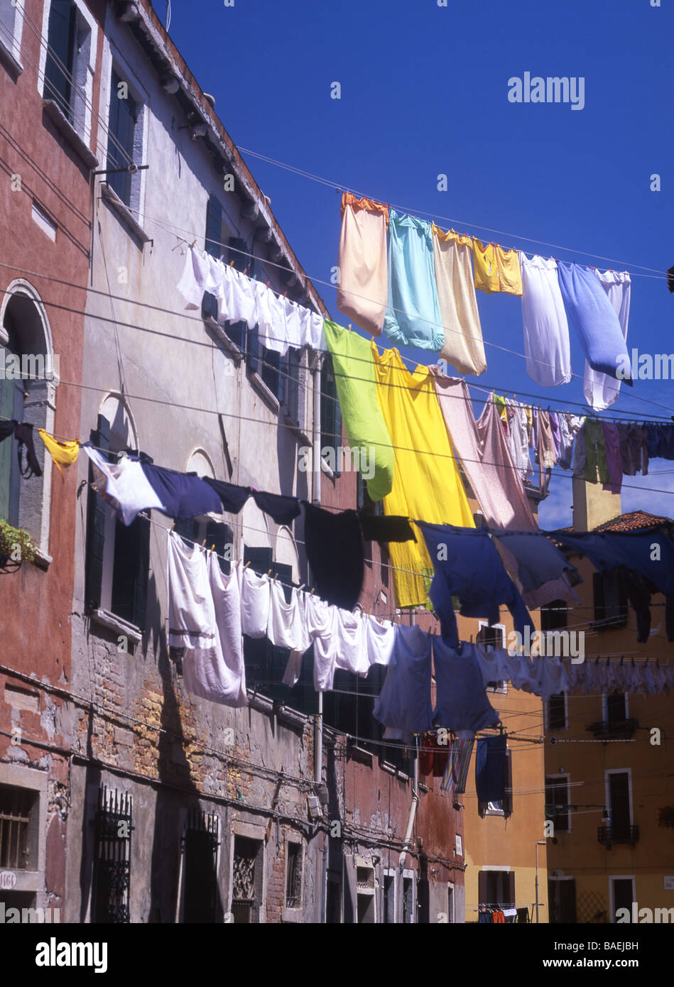 Washing on lines in typical Venetian street Near Riva dei Sette Martiri Castello sestier Venice Veneto Italy Stock Photo