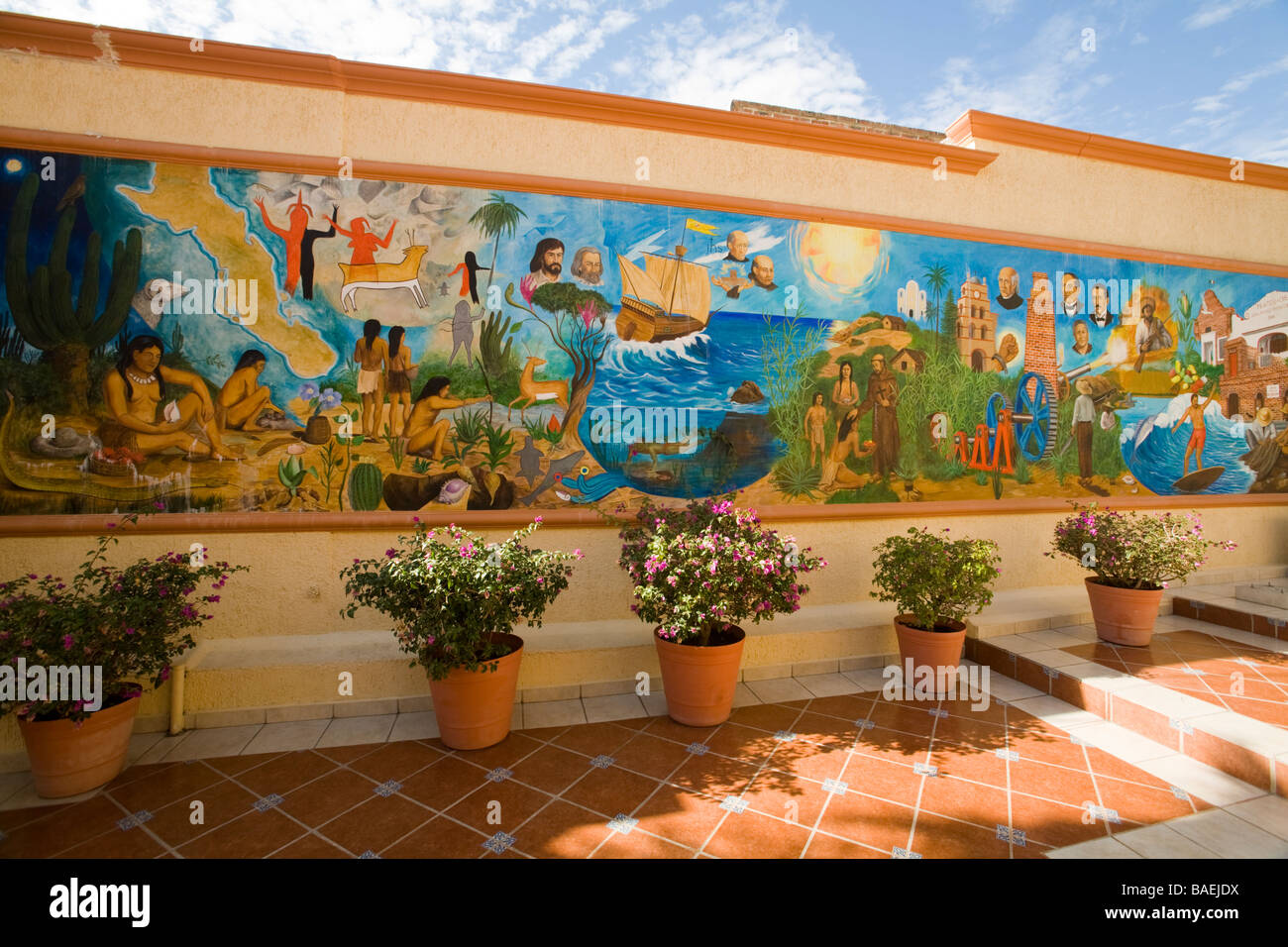 MEXICO Todos Santos Painted mural in plaza showing history of small Mexican town Stock Photo