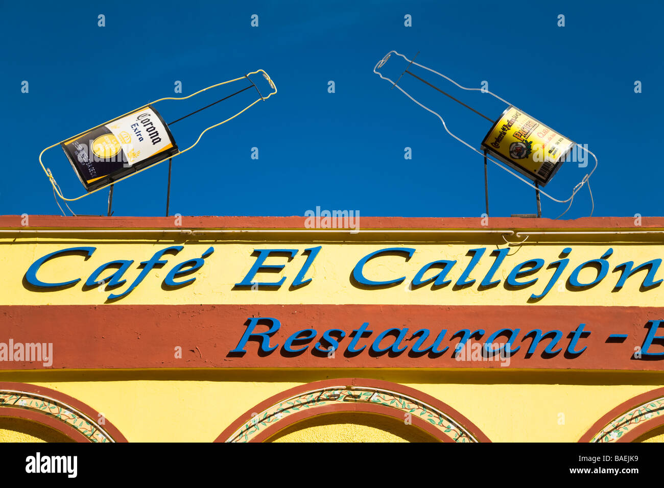 MEXICO La Paz Corona beer bottle signs about El Callejon restaurant and bar sign building exterior in downtown area Stock Photo