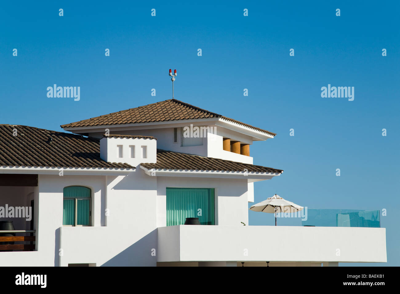 MEXICO San Jose del Cabo Balcony of penthouse suite with umbrella at Cabo Azul resort Stock Photo