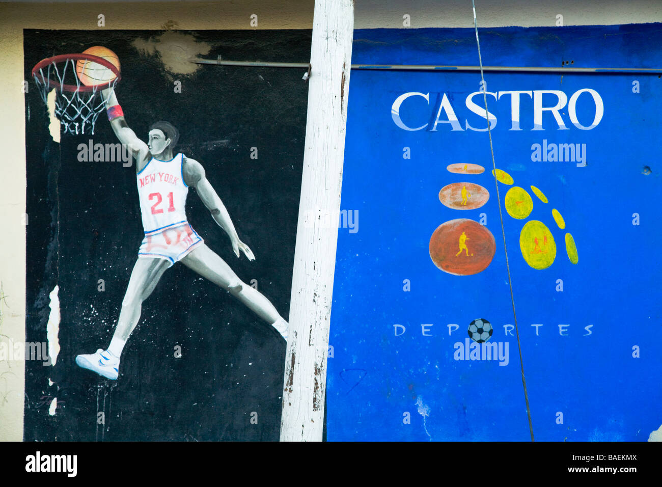 MEXICO San Jose del Cabo Street mural of basketball playing dunking ball in basket for Castro sporting goods store Stock Photo
