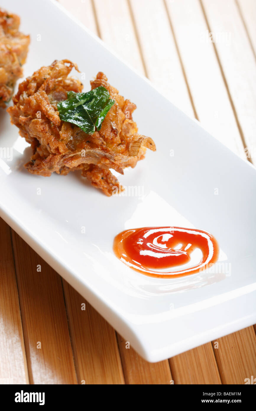 Kanda bhajjia is a onion fritters made of besan Stock Photo Alamy