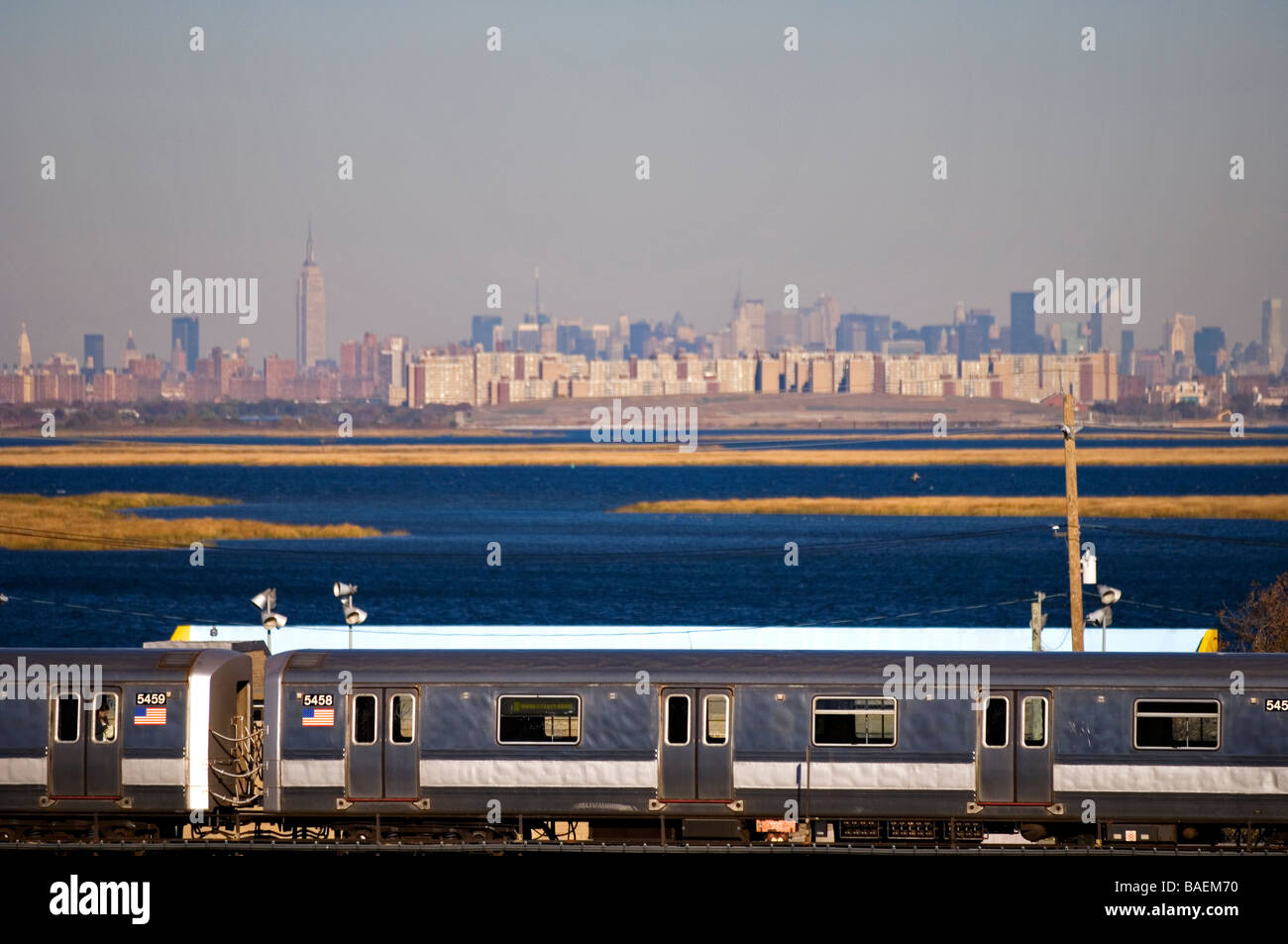 Manhattan skyline & Jamaica Bay Refuge seen from Rockaway Beach with