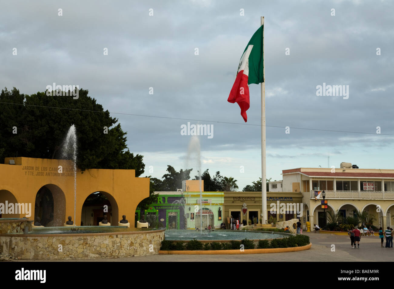 MEXICO San Jose del Cabo Mexican flag and fountains in downtown plaza stores and restaurants in business district Stock Photo