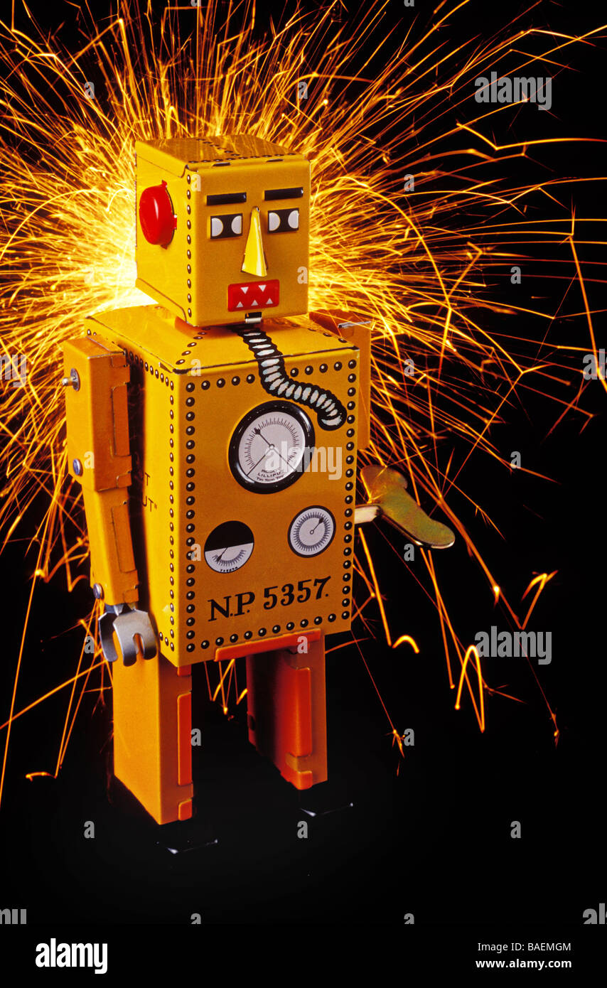 Yellow robot with sparks Stock Photo