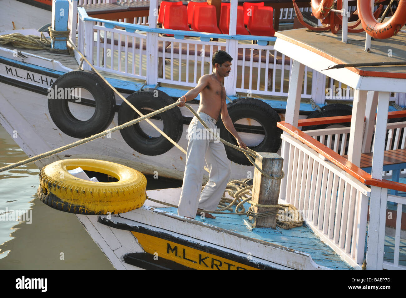 A Sailor Working on the boats in Mumbai, India Stock Photo