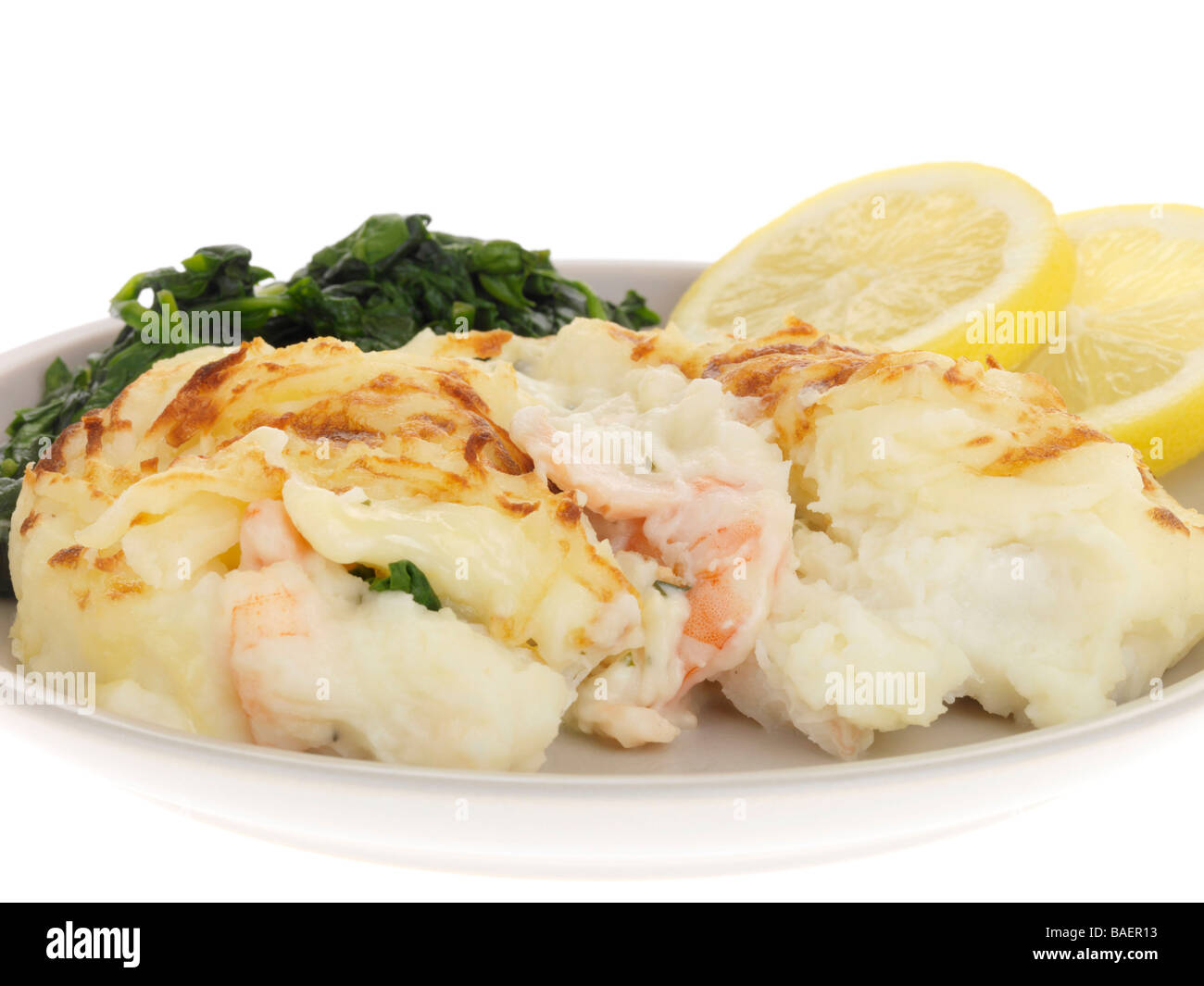 Fish Pie with Steamed Spinach Stock Photo - Alamy
