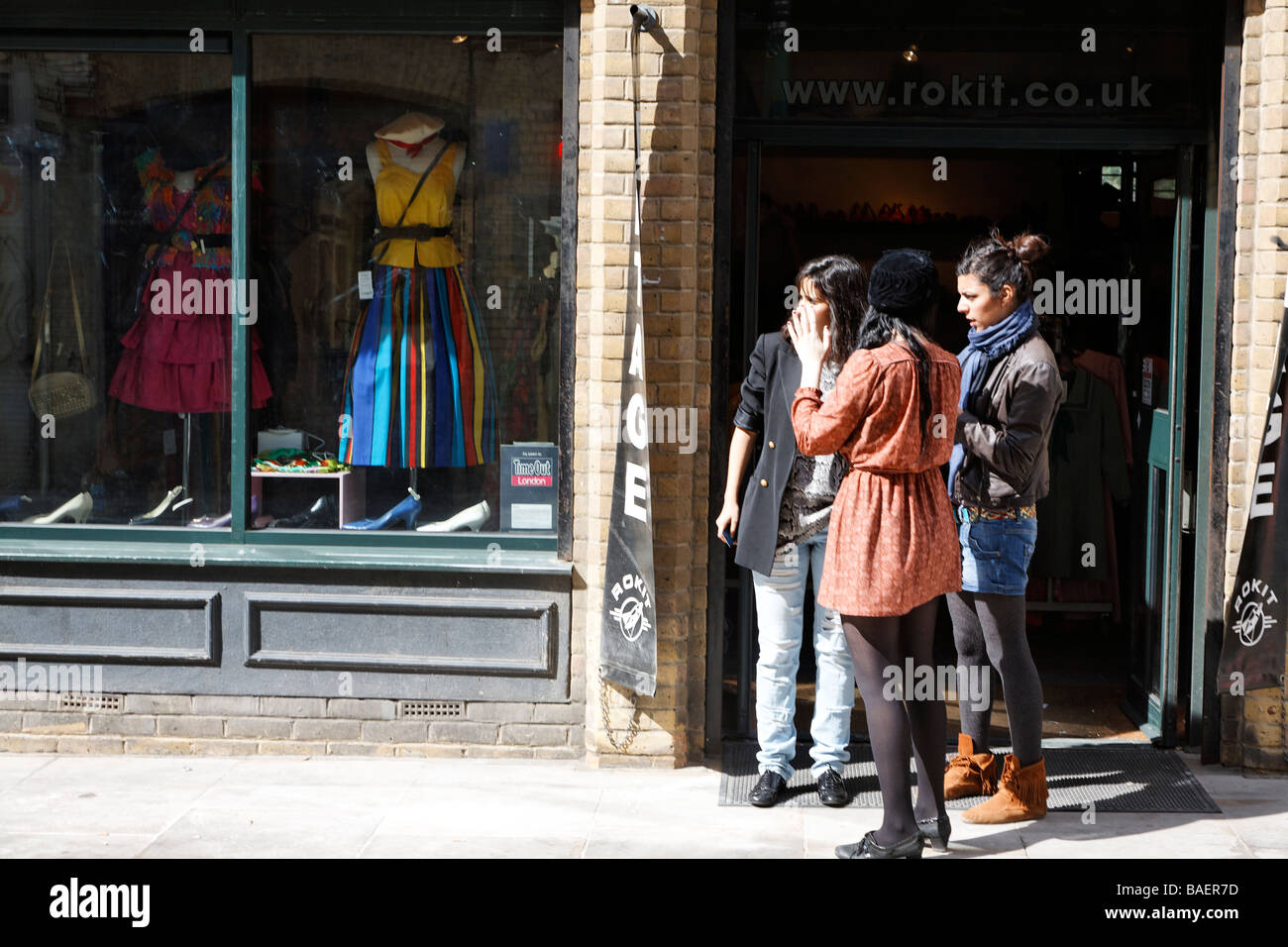 Women outside retro vintage clothing shop Brick Lane London England Stock  Photo - Alamy