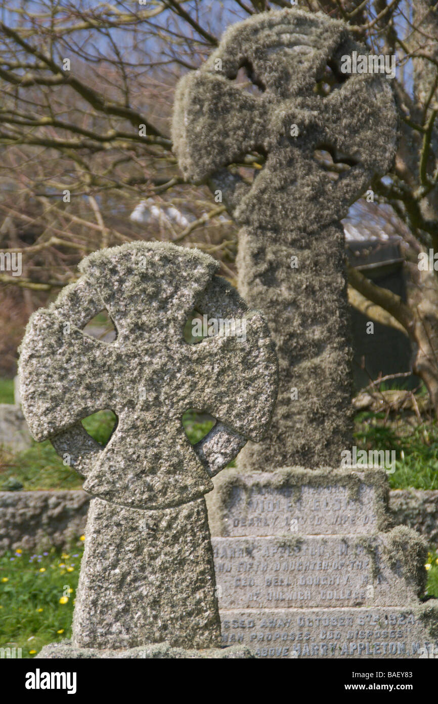 Two Maltese cross grave stones in graveyard at Church Cove, near the Lizard, South Cornwall coast, England Stock Photo