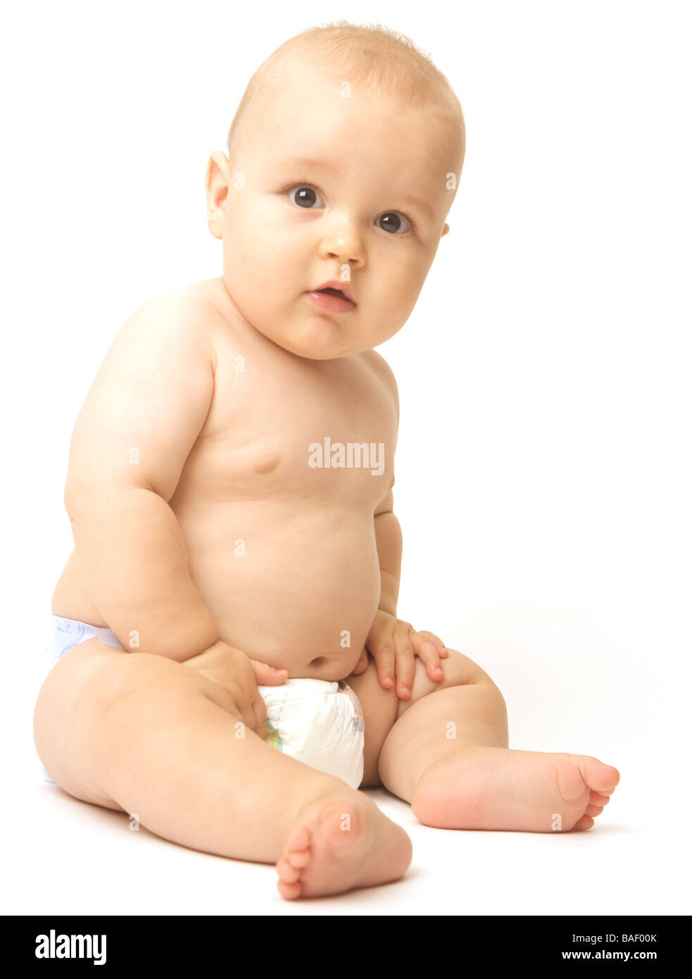 Young boy against a white background Stock Photo