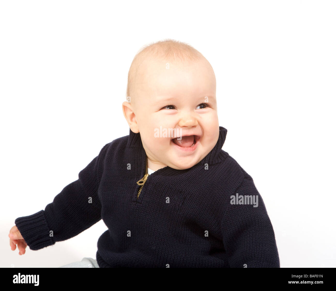 Young boy against a white background Stock Photo
