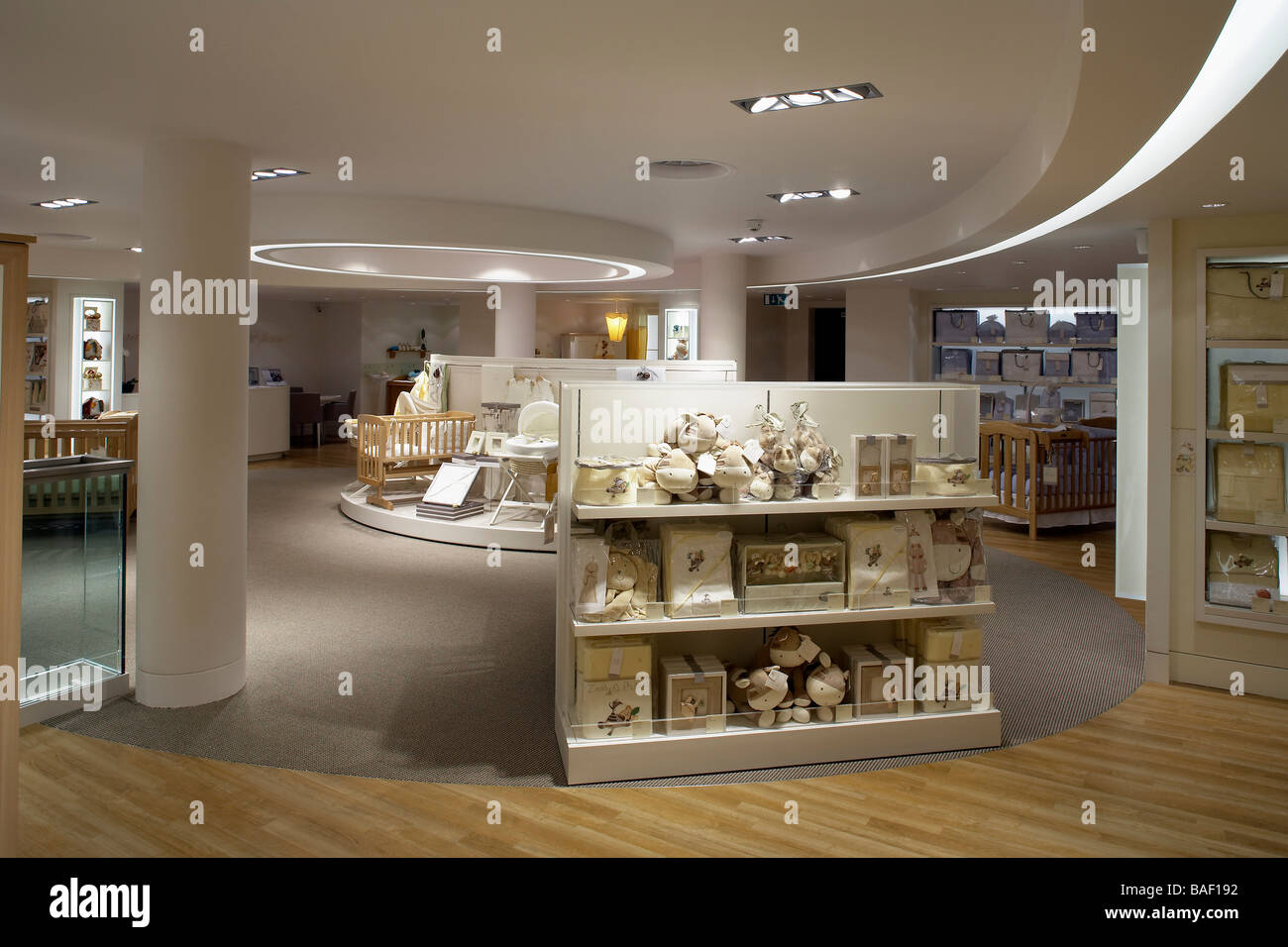 Mamas and Papas, London, United Kingdom, Four IV Design, Mamas and papas store 1ST floor showing display units with central Stock Photo