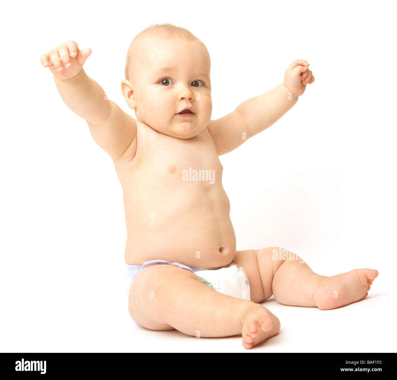 A baby with outstretched arms Stock Photo