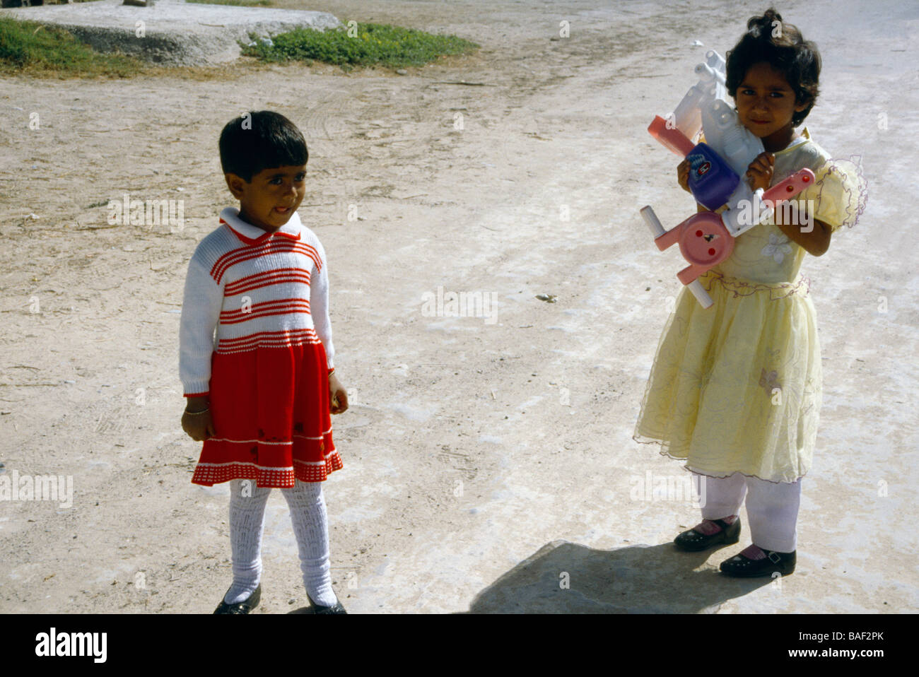 Sharjah UAE Children With Plastic Toys Stock Photo Alamy