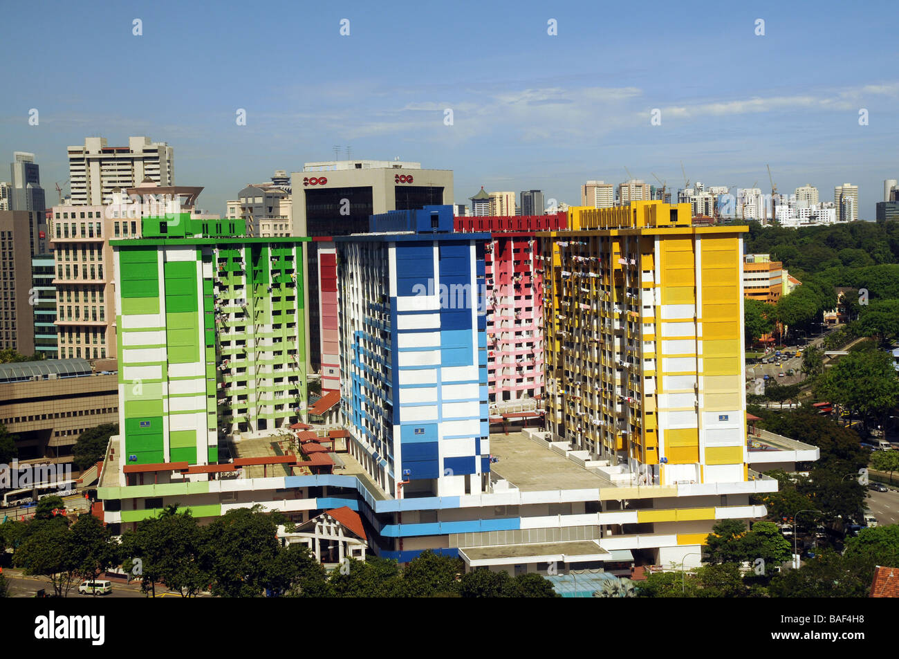 Singapore, A colourful block of flats, can only grow upwards now, hence so many tower blocks, and people live in apartments only Stock Photo