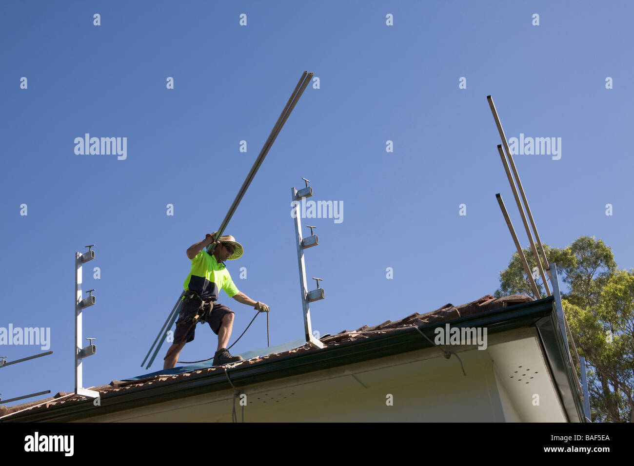 Balancing carrying safety rails hires stock photography and images Alamy