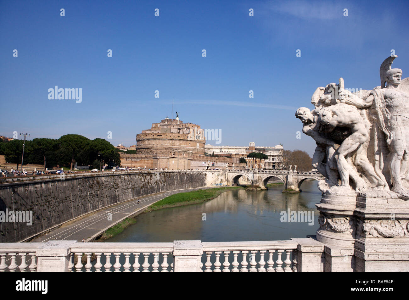 Bridge with statue crossing the Tiber in Rome Italy Stock