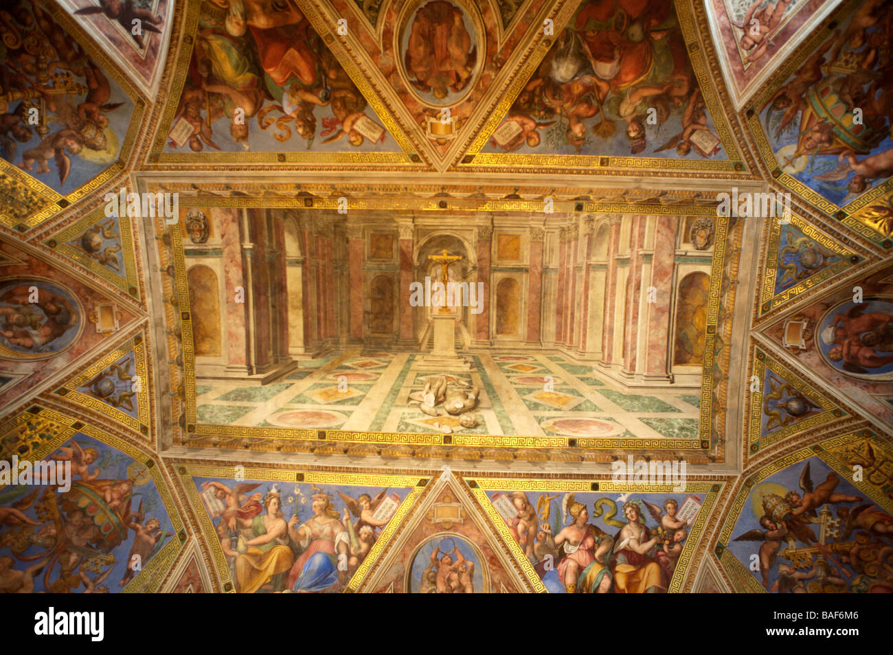 One of the ornately painted ceiling leading to the Sistine Chapel in the Vatican in Rome Stock Photo