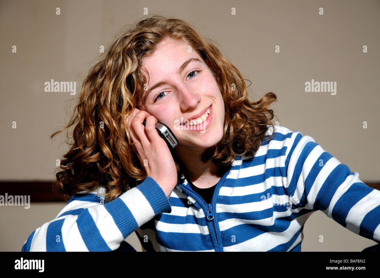 closeup of pretty girl on mobile phone Stock Photo
